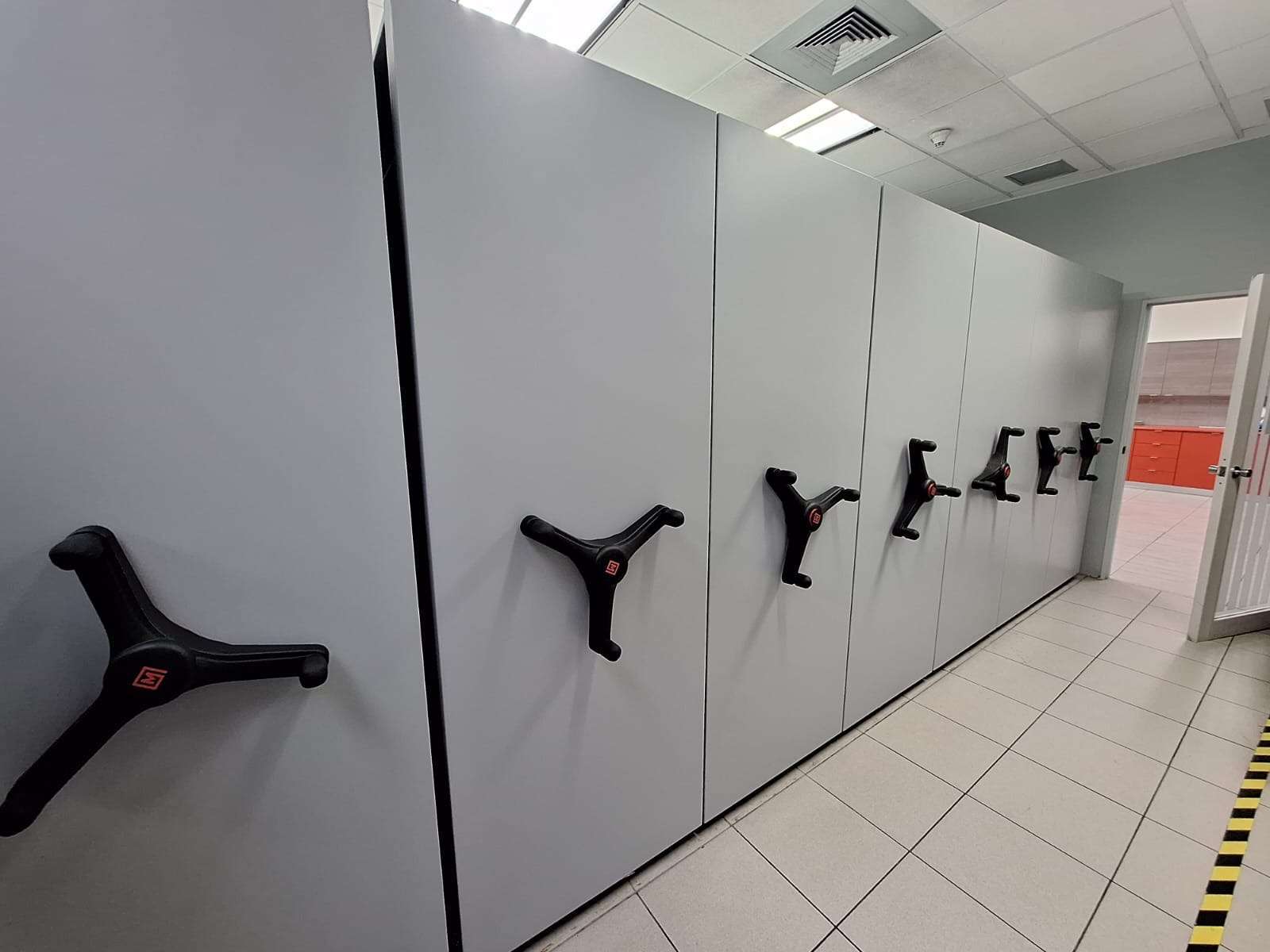 Closed white mobile storage carriages